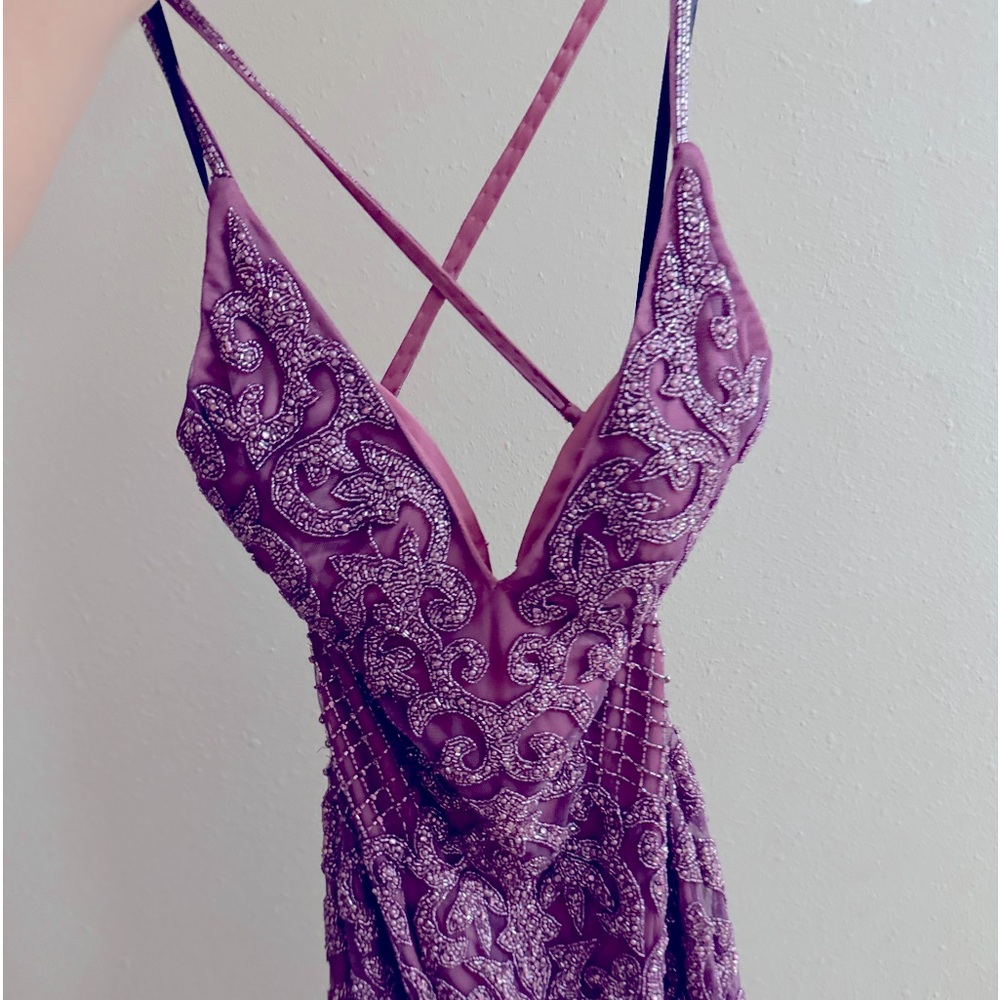 This is a purple prom dress, worn only one time. It’s in great condition.